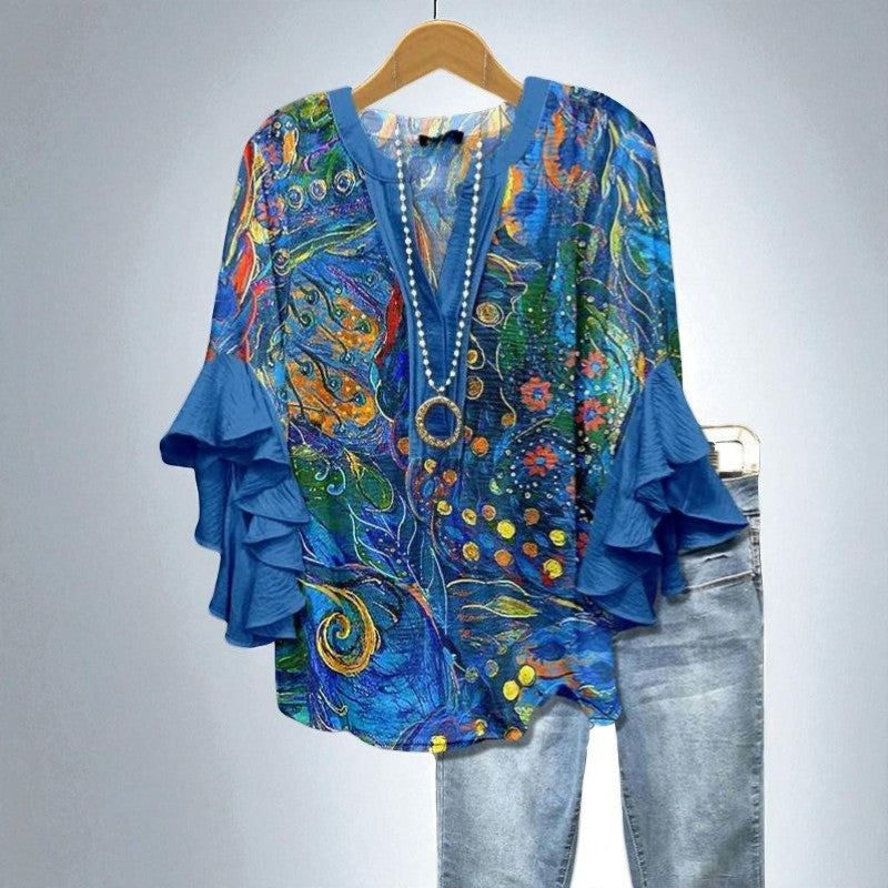 Aurianne – Blouse artistique aux couleurs vibrantes et manches à volants